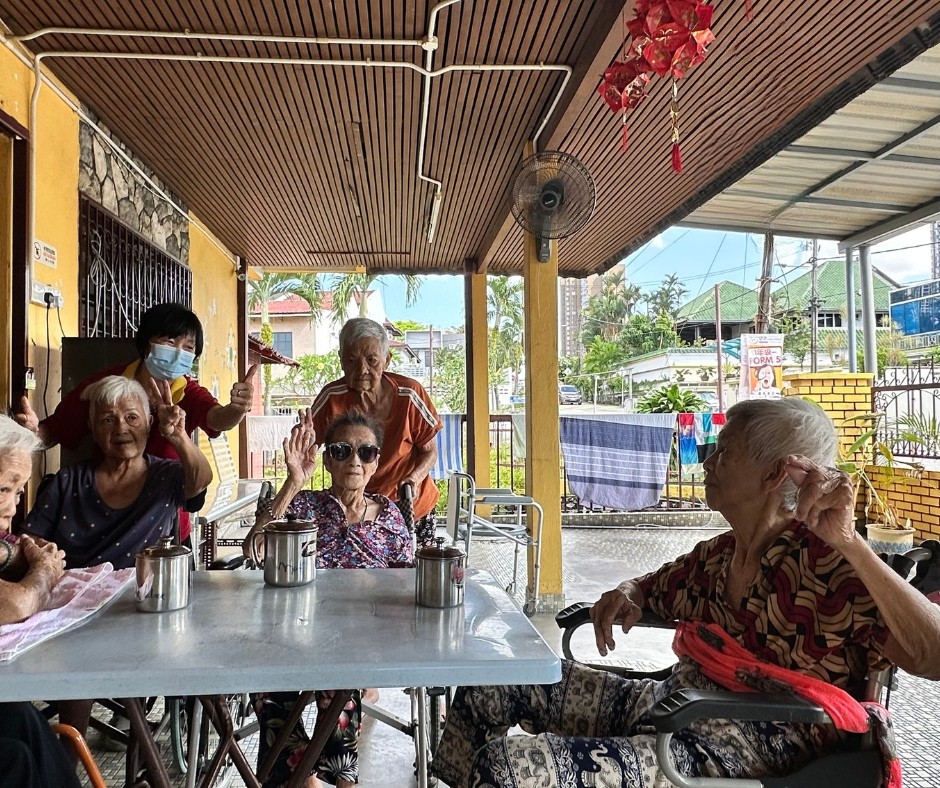 Elderly residents gathering together at Amitabha Foundation